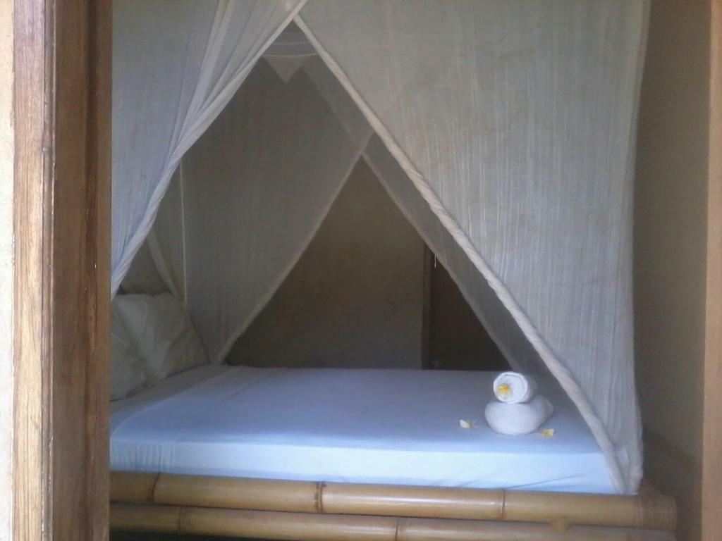 Baleku Homestay Trawangan กีลีตราวางัน ภายนอก รูปภาพ
